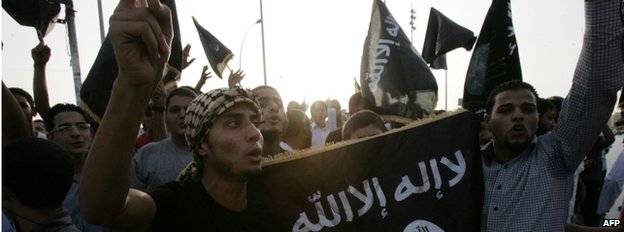  Supporters and members of Ansar al-Sharia shout slogans during a demonstration against a film that is insulting to Islam in Benghazi, 14 September 2012 