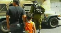  Wadi Maswadeh being led to an Israeli army jeep 