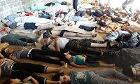  A handout image released by the Syrian opposition's Shaam News Network shows bodies of children and adults laying on the ground as Syrian rebels claim they were killed in a toxic gas attack by pro-government forces in eastern Ghouta, on the outskirts of Damascus on August 21, 2013. 