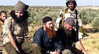  Omar Shishani (centre) and other Chechen fighters in Syria 