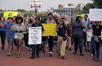  Crowd protesting police brutality led by a Muslim. Photo Courtesy Baltimore Sun 